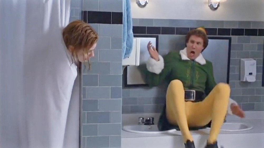 Zooey Deschanel as Jovie and Will Ferrell as Buddy in Elf