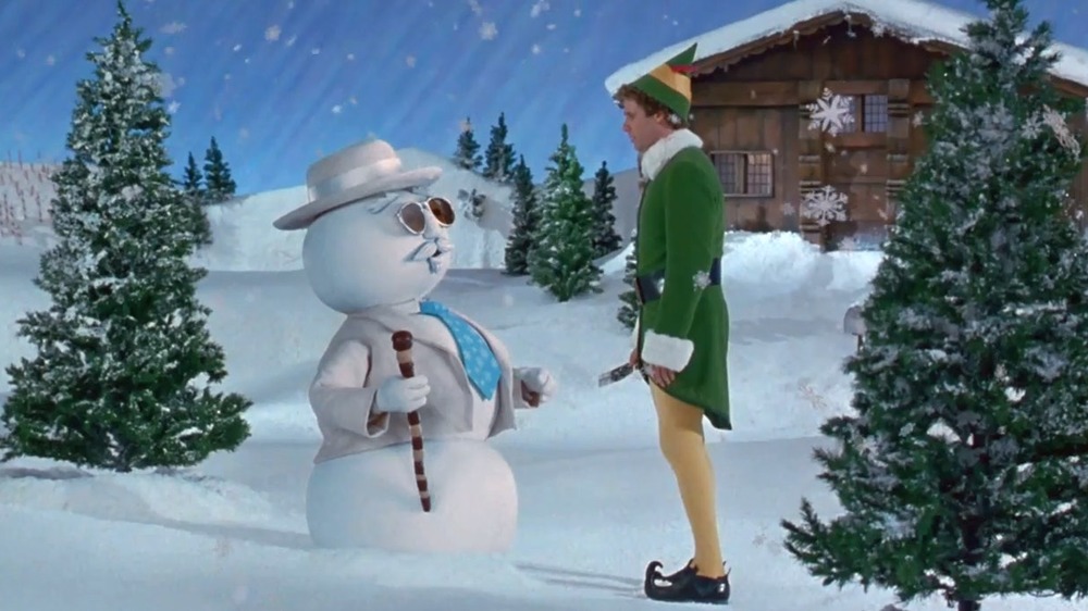 Buddy talks to snowman