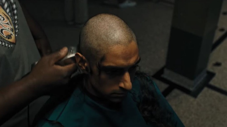 Eman Esfandi getting hair shaved