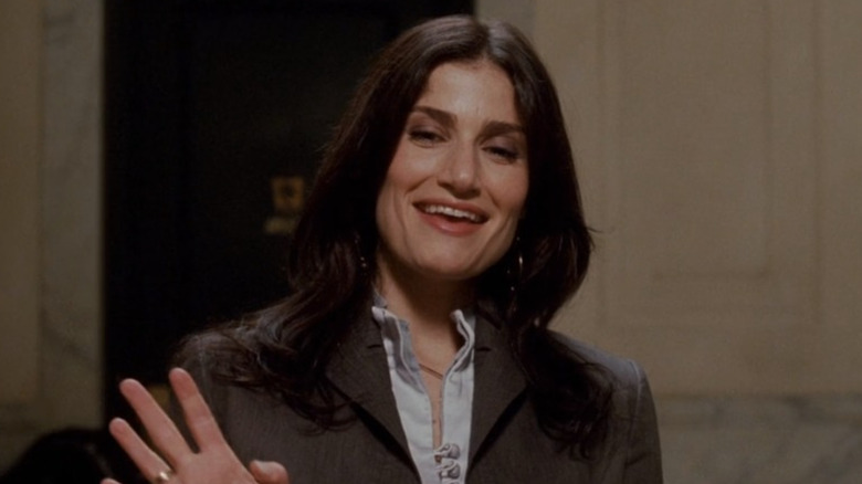 Idina Menzel waving hello