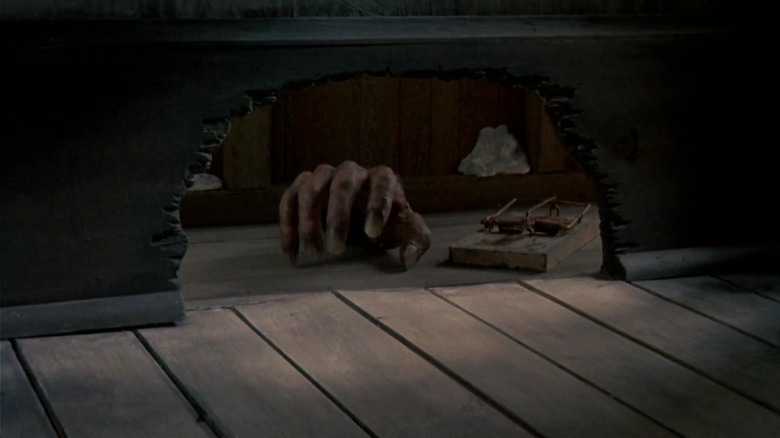 Ash's severed hand hiding