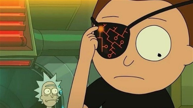 Evil Morty presses a button