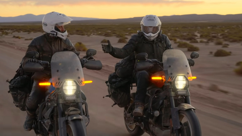 Ewan McGregor riding a motorcycle