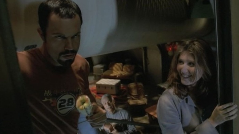 Adam Baldwin and Jewel Staite in Firefly ship