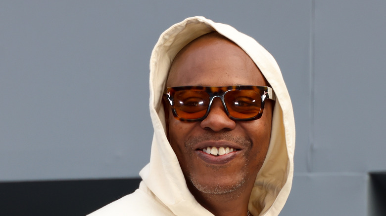 Dave Chappelle in a hoody 