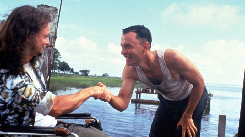 Tom Hanks and Gary Sinise shaking hands 