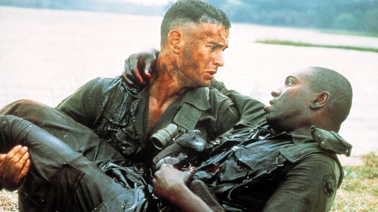 Forrest Gump carrying a wounded Bubba 