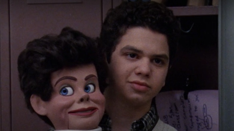 Samm Levine holds dummy 