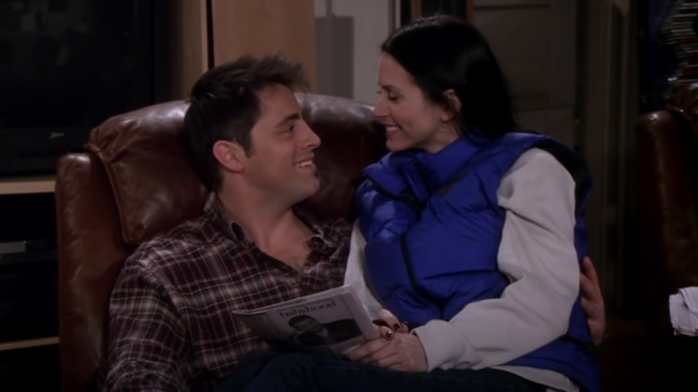 Joey and Monica on sofa