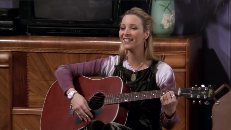 Phoebe playing guitar