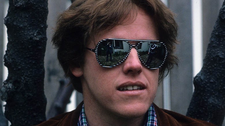 Gary Busey poses for portrait with sunglasses