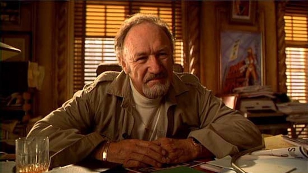 Gene Hackman smiling smugly