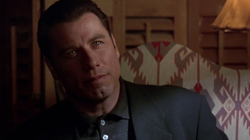 Travolta smirking in Get Shorty