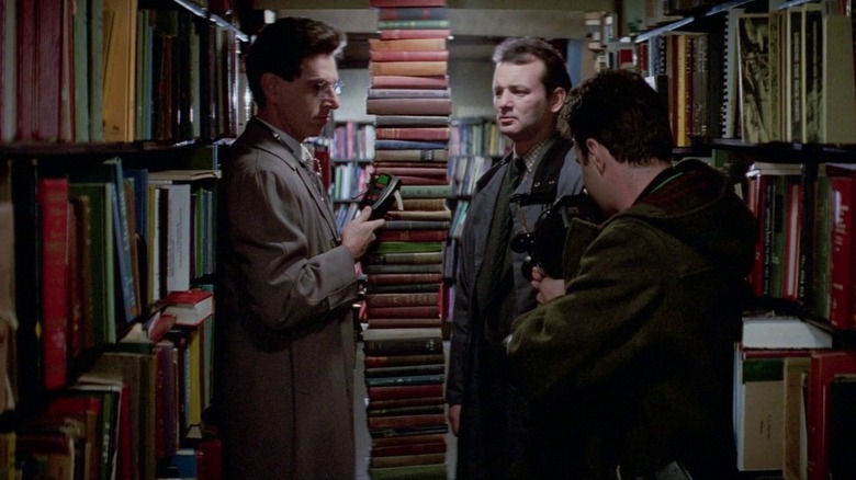 Harold Ramis and Bill Murray in a library