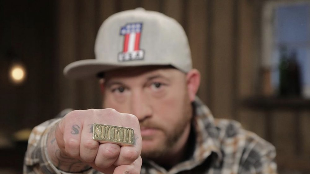 Rick Ness shows off some bling on Gold Rush