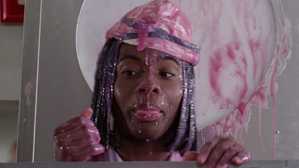 Kel Mitchell as Ed in Good Burger enjoying a strawberry milkshake