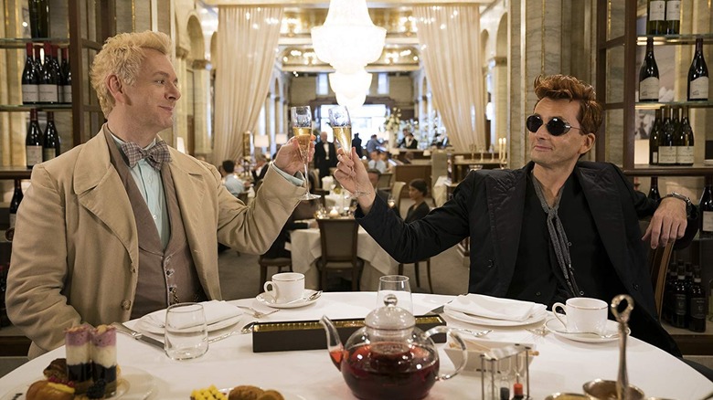 Aziraphale and Crowley toast drinks