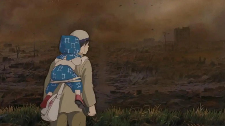 Seita and Setsuko looking out over smoky landscape