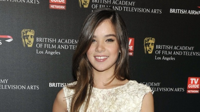 Young Hailee Steinfeld smiling on red carpet