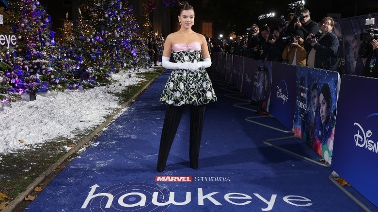 Hailee Steinfeld standing at Hawkeye launch event