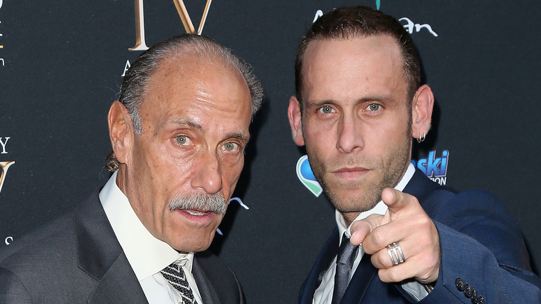 Les Gold and Seth Gold pointing at the camera