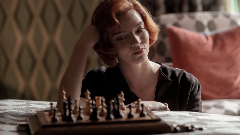 Beth Harmon playing chess