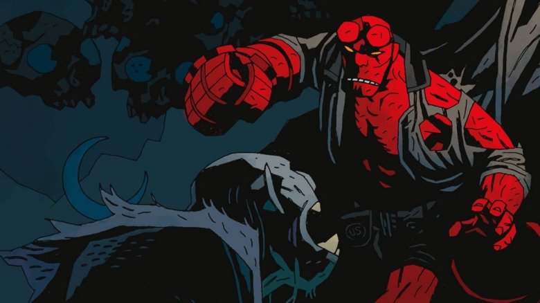 Hellboy about to punch a vampire