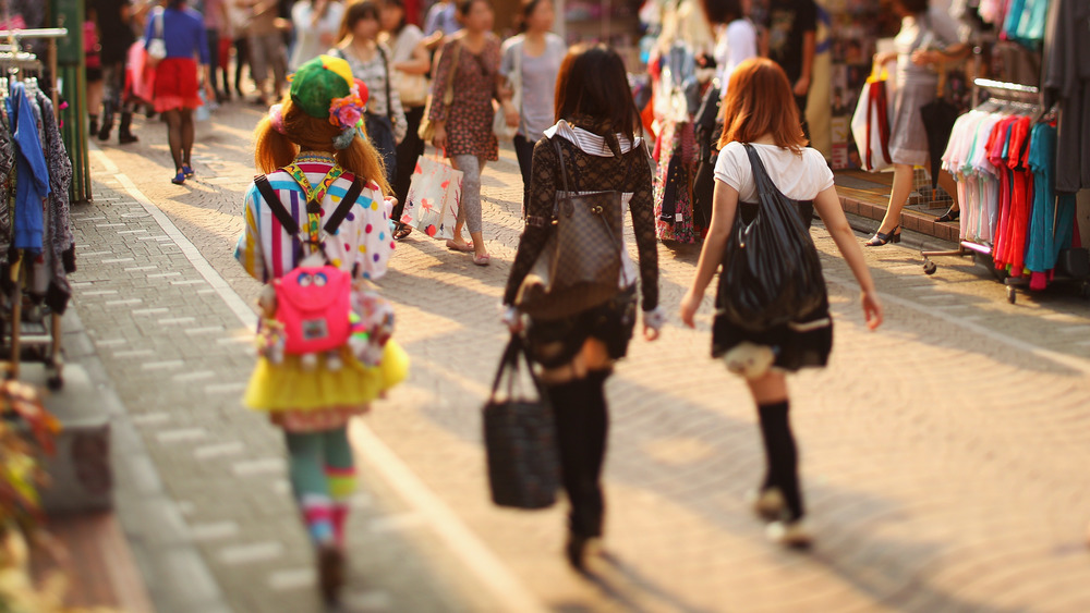 A group of girls walk through Tokyo's Harajuku district