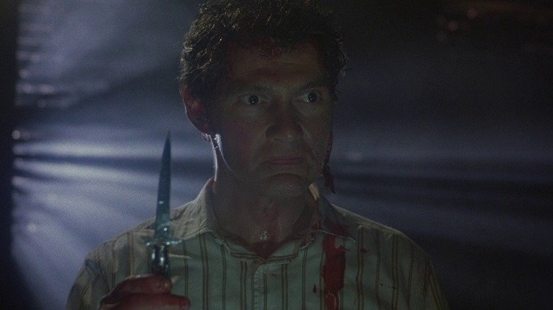 Hellraiser's Larry Cotton with a knife 