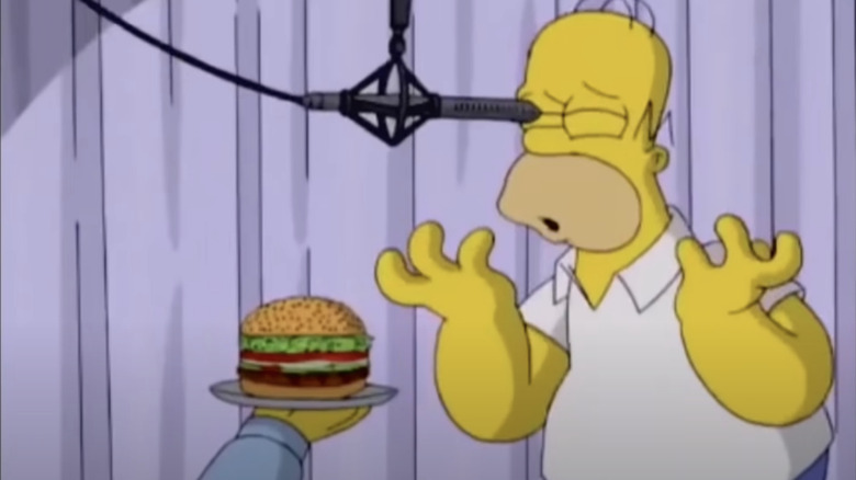 Homer with a microphone in his eye