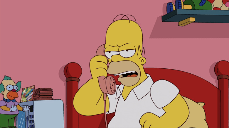 Homer Simpson talks a Krusty phone