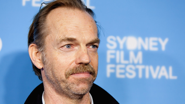 Hugo Weaving looking away