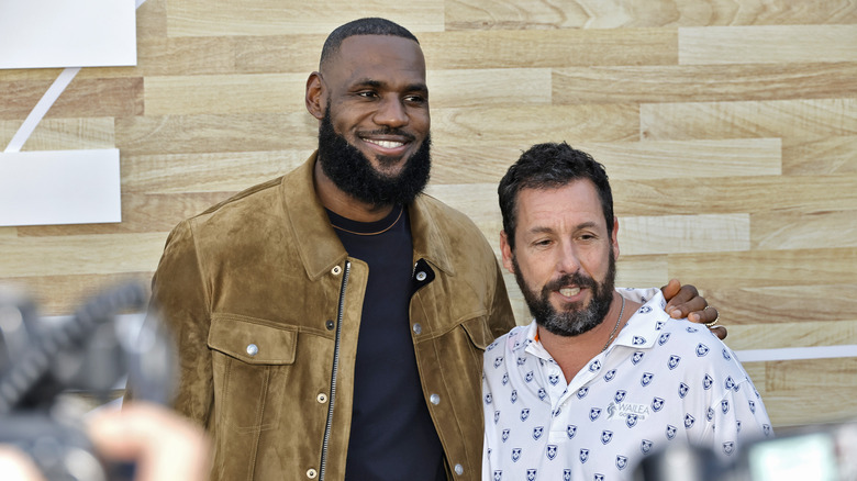 Adam Sandler and LeBron James smiling