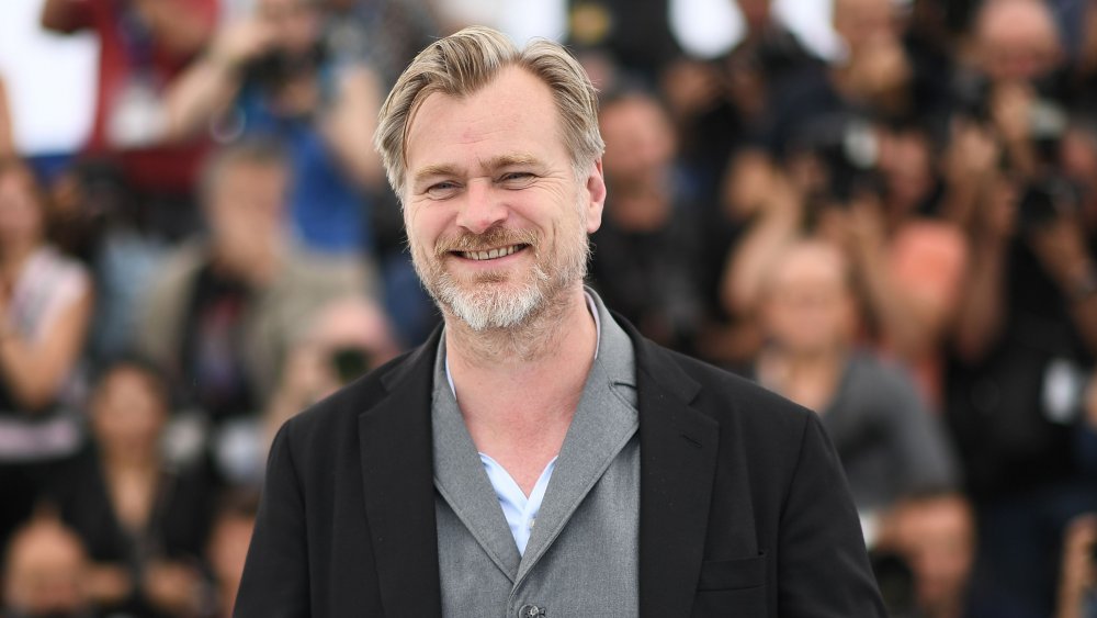 Christopher Nolan smiles at the 2018 Cannes Film Festival