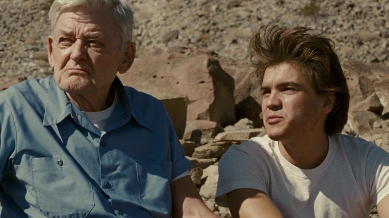 Franz and McCandless sitting in desert