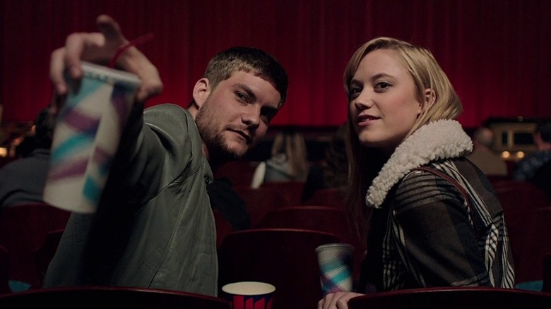 Jay and boyfriend turning around in movie theater