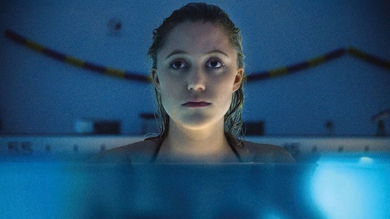 Jay stares ahead while in pool