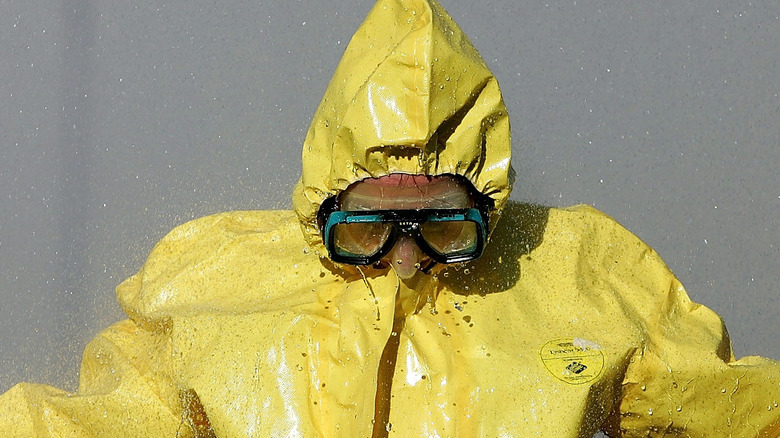 Man in yellow HAZMAT suit