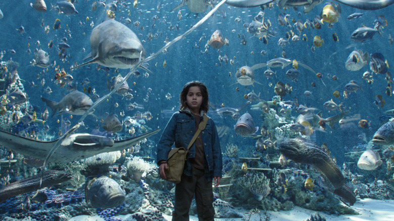 Young Arthur Curry surrounded by fish