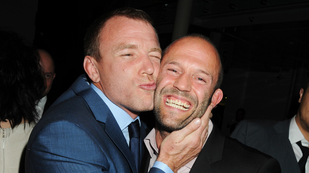 Guy Ritchie embracing Jason Statham