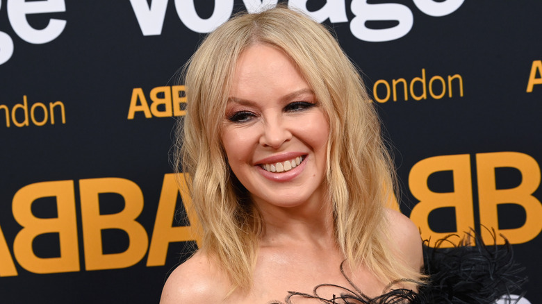 Kylie Minogue smiling on red carpet