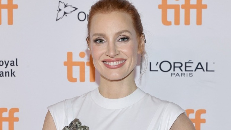 Jessica Chastain smiling on TIFF red carpet