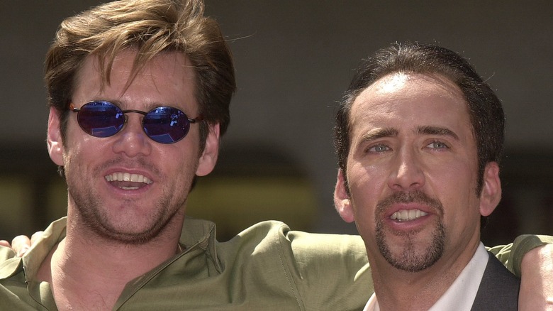 Jim Carrey and Nicolas Cage smiling together