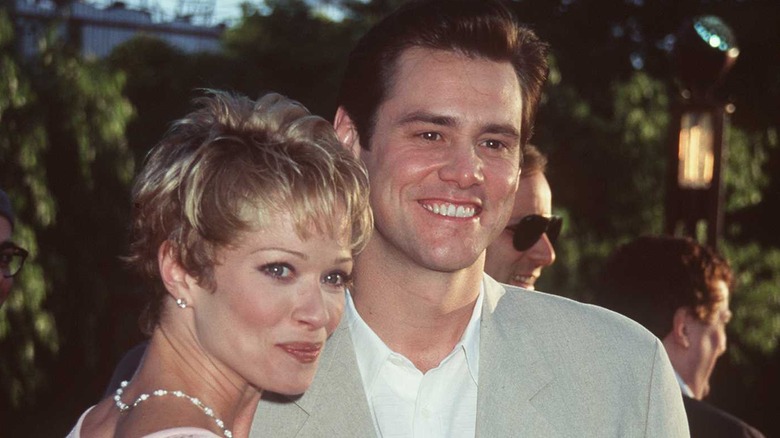 Jim Carrey and Lauren Holly smiling