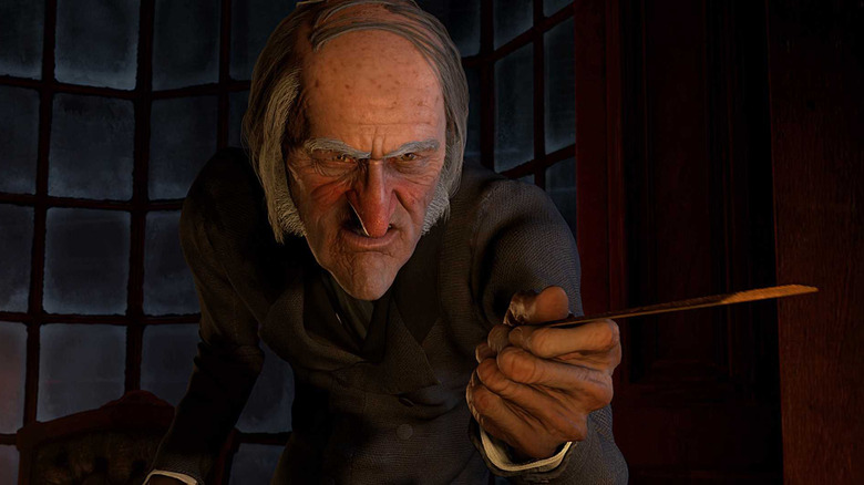 Jim Carrey scowls as Ebenezer Scrooge