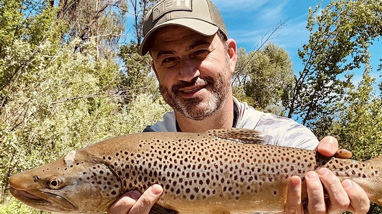 Kimmel smiling with a fish