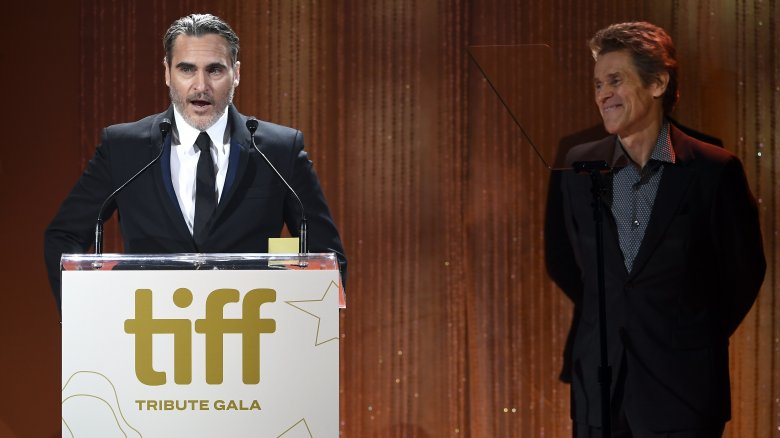 Joaquin Phoenix and Willem Dafoe onstage