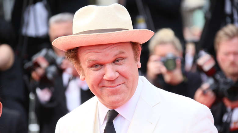 John C. Reilly wearing hat