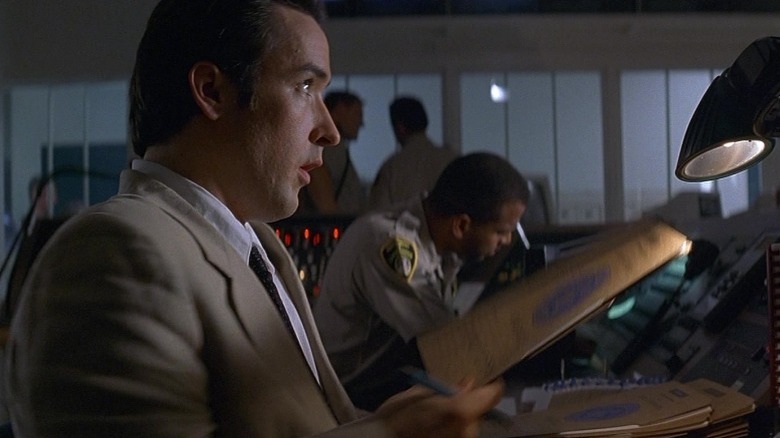 Vince Larkin in comm center in Con Air