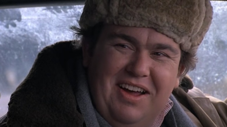 John Candy smirking 